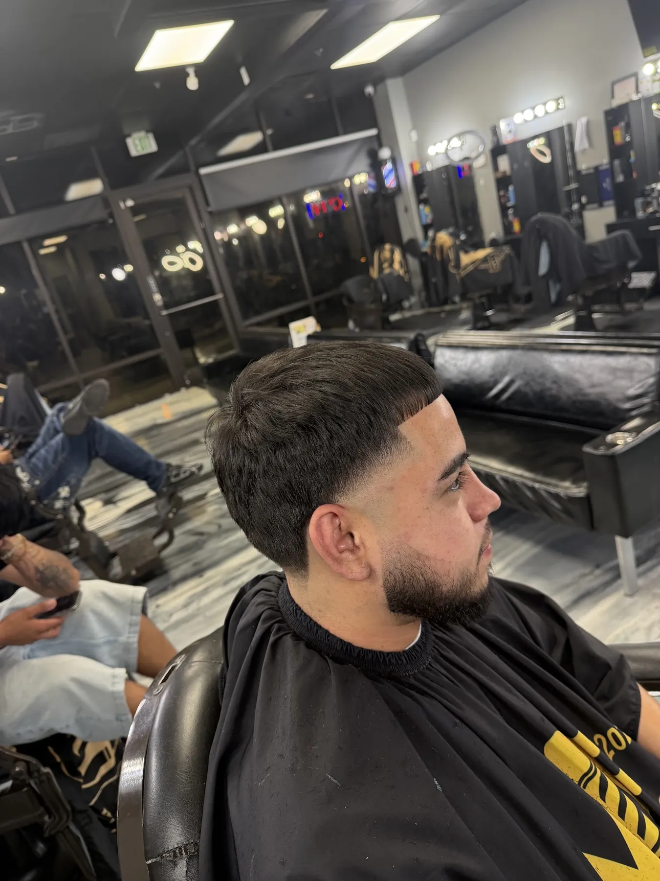 Mid fade with beard at VIP Barber Lounge South Aurora
